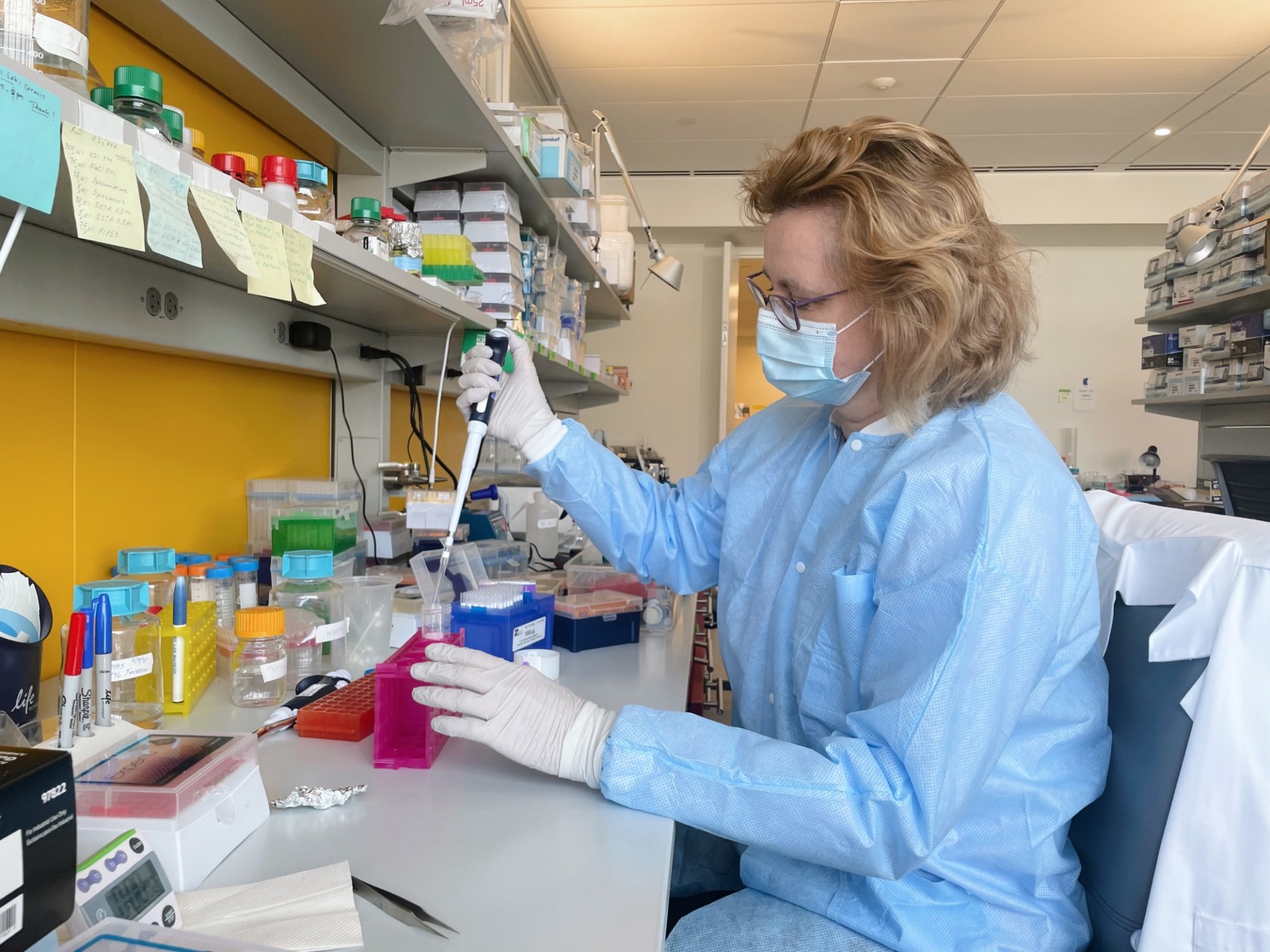 Natalia pipetting a solution 